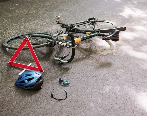 No people. Place of hit. Bicycle accident on the road in forest at daytime.