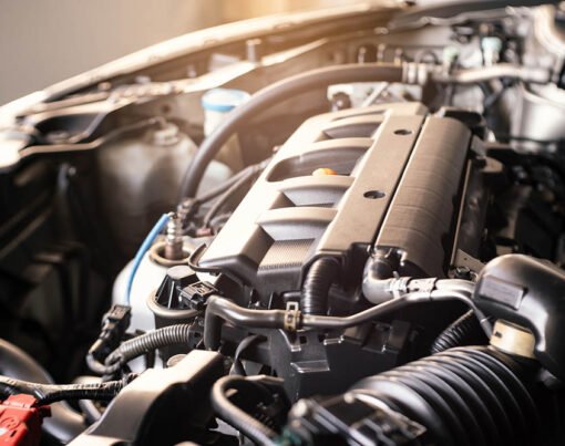 details of modern car engine with sunlight effect, shallow depth of field